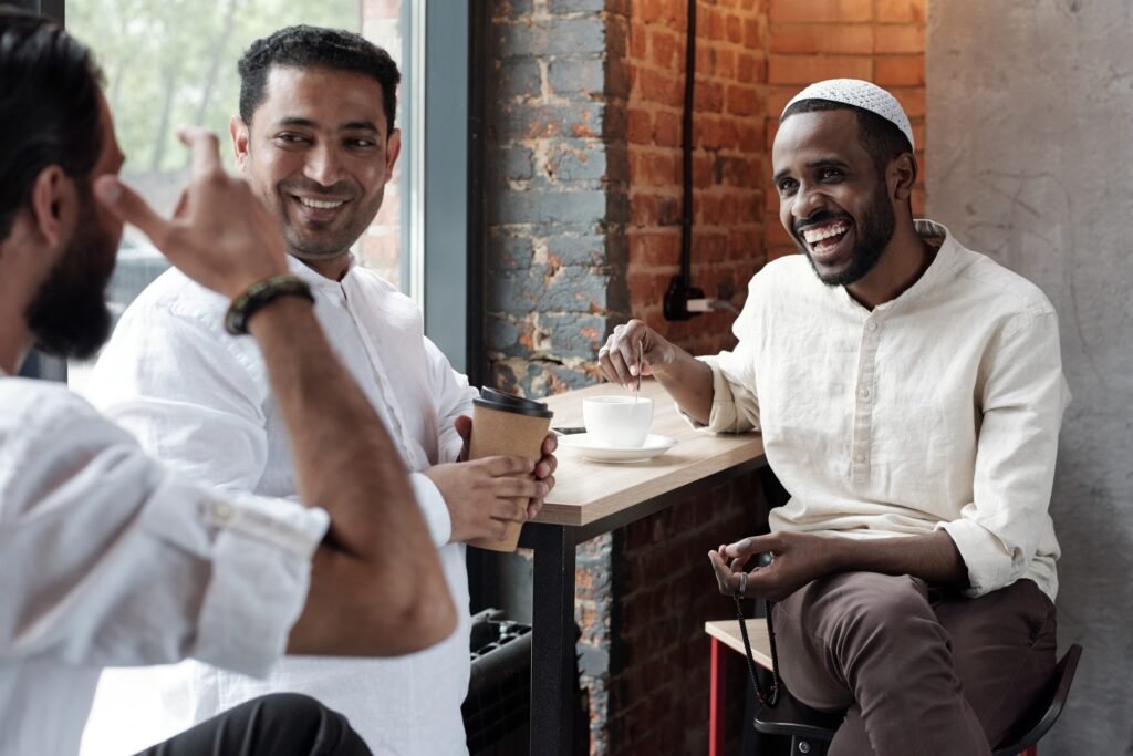 Muslim Friends Gathering In Cafe